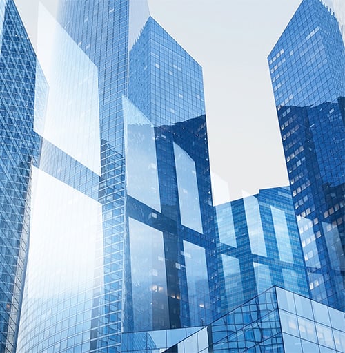 Double exposure of windows and blue skyscraper buildings