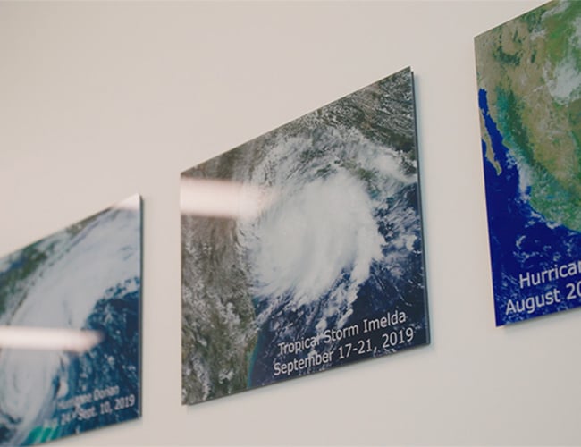 Three photographs of hurricane storms